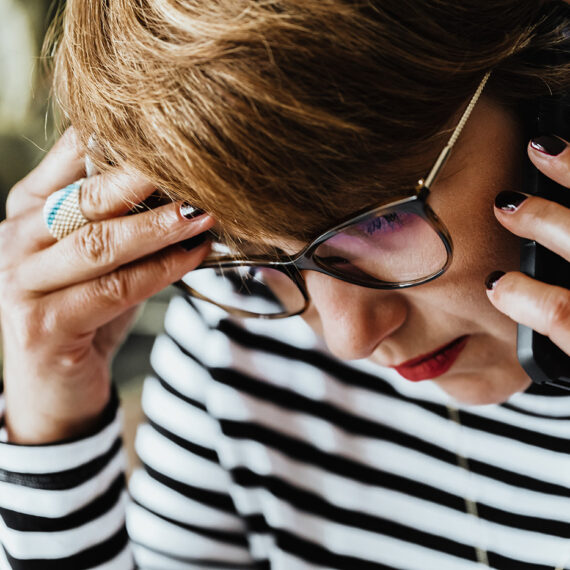 Woman on her phone looking busy
